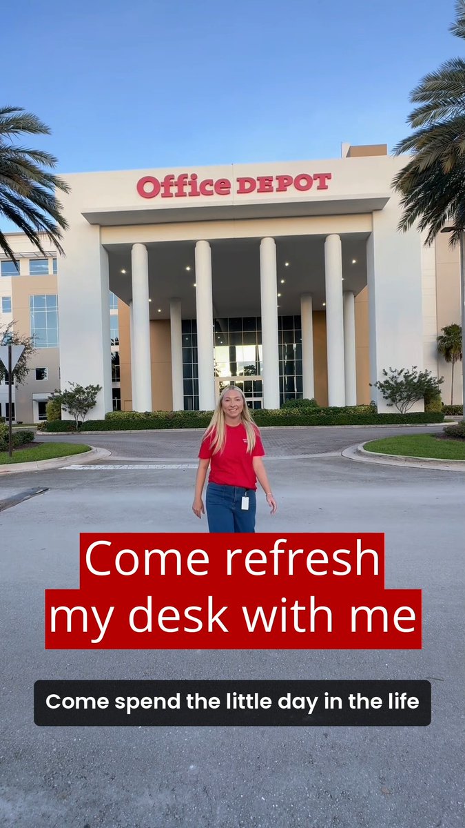 A woman wearing a red t-shirt stands in front of an Office Depot store with text overlay reading 'Come refresh my desk with me' and 'Come spend the little day in the life'.