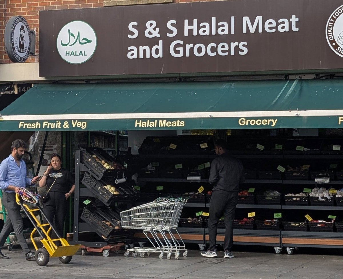 DrMarianaClaire's tweet photo. What was Harman Singh Kapoor's wife doing coming out of a Halal store? https://t.co/UrT3yVimty