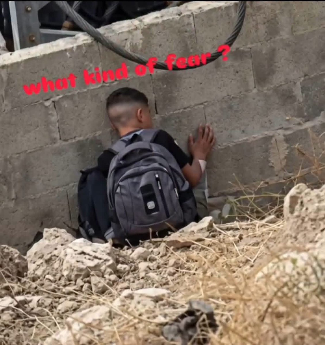 Astridueil's tweet photo. Can you imagine how terrified Palestinian children are when they see Israeli soldiers, making them hide away in fear ? https://t.co/I6slKTz83V