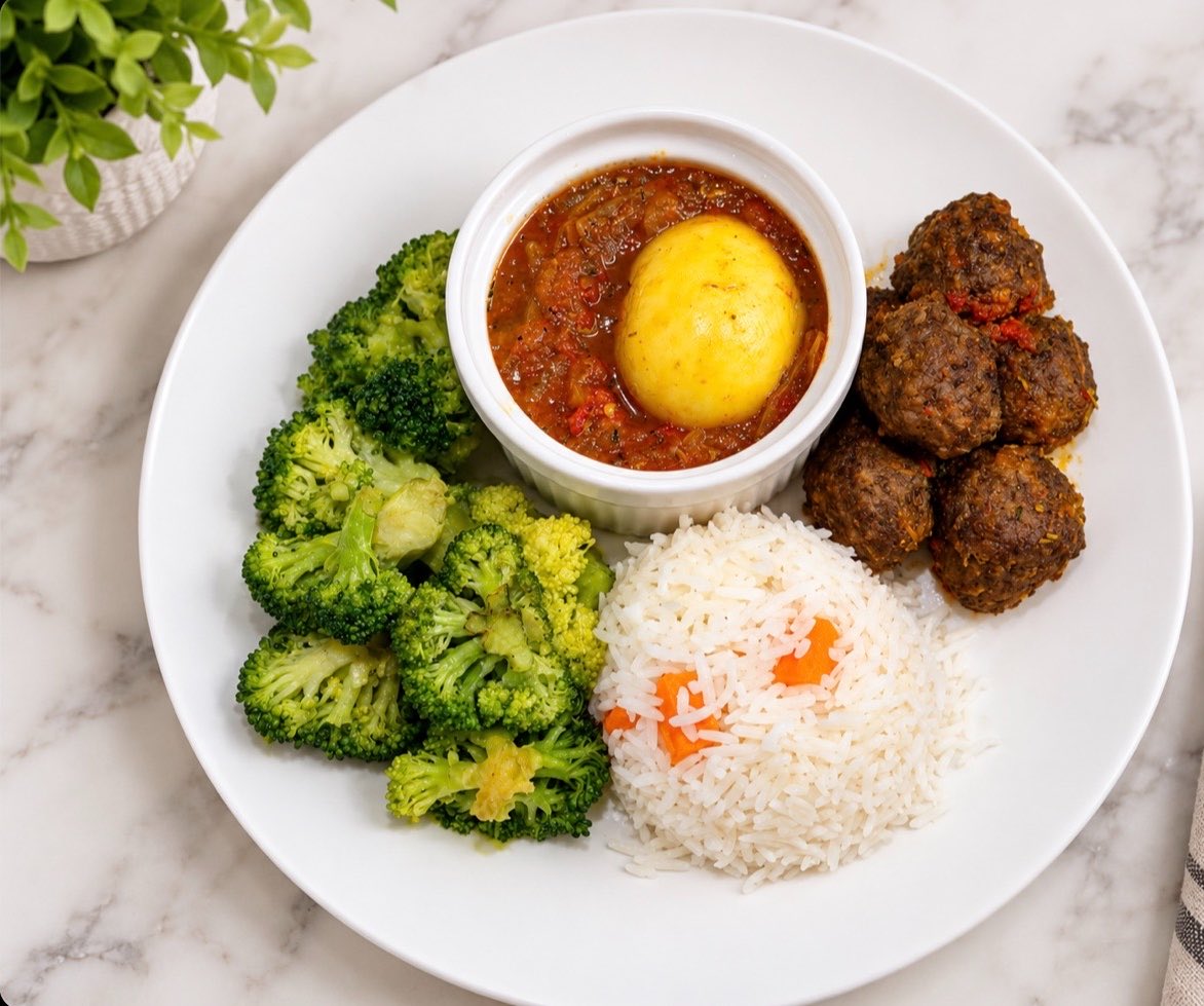 blaq_en_belle's tweet photo. White rice, meatballs, broccoli, a boiled egg and a little hot sauce.

Nothing complicated. Just a good, filling meal with a bit of everything I need.

What would you add or remove from this plate? https://t.co/65Xvj1cSva