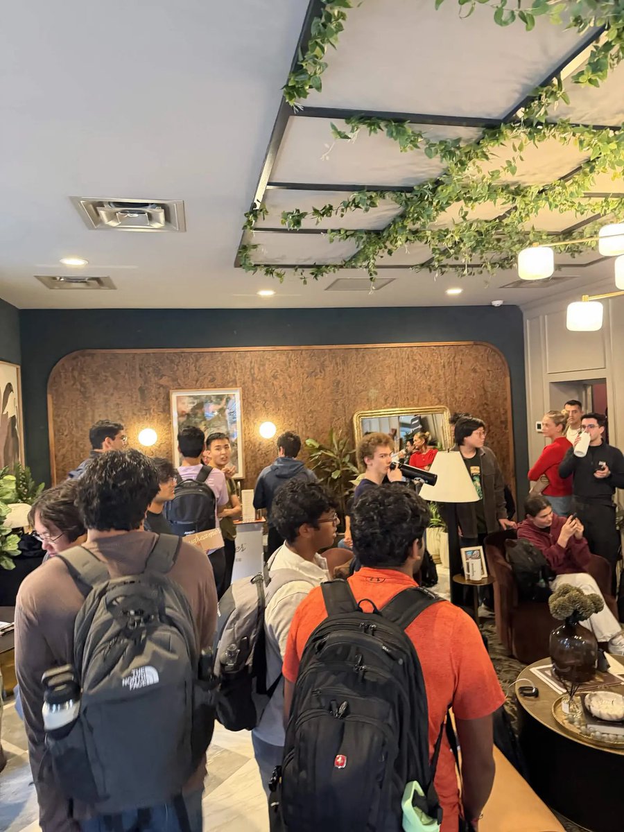 rayhanadev's tweet photo. had way too much fun last week throwing together a very impromptu Astra Commons with @OpenAIDevs :)

50+ people ended up packing into our little café to hang out, meet other builders, and jam on projects. super fun seeing something we threw together so quickly turn into this much energy!!