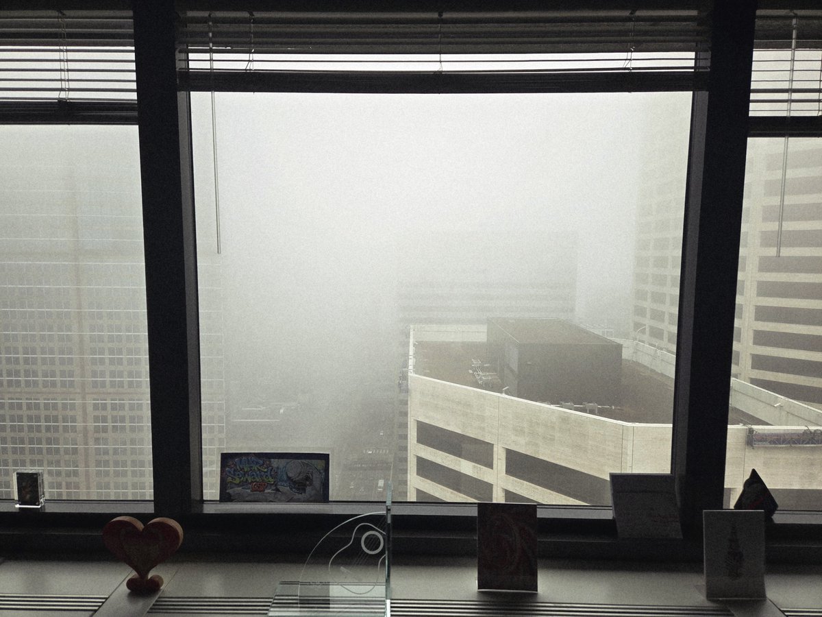 D4Commish's tweet photo. View of the fog from the tippy top of the government center. https://t.co/rODFIRStb3