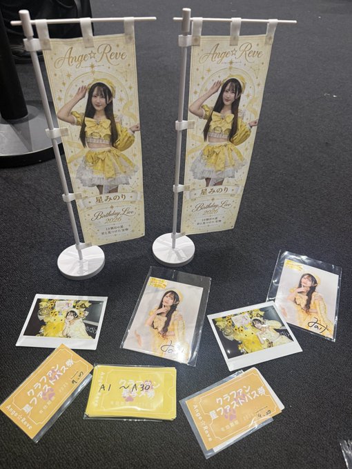 Promotional merchandise for the idol Ange☆Reve's 'Birthday Live 2026' featuring banners, polaroids, and ticket cards for '星乃みのり'.