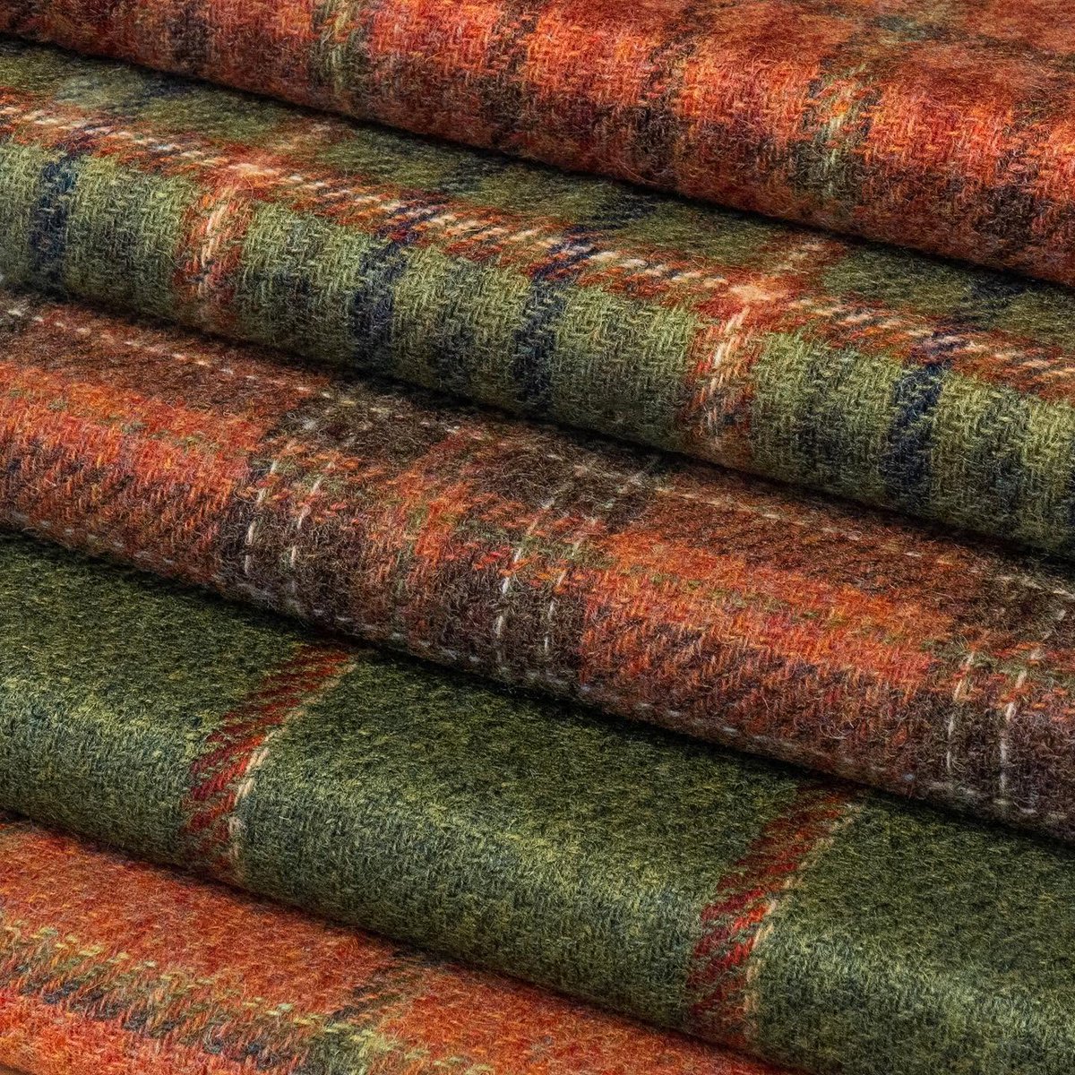 dieworkwear's tweet photo. Harris Tweed is a protected name, regulated by the Harris Tweed Authority, which requires the cloth to be handwoven in the Outer Hebrides from pure virgin wool that has been dyed and spun there. It's the most well-known tweed and perhaps the one most people will encounter, as it's abundant in thrift shops. The material has a lovely heritage, but if I'm being honest, it's also my least favorite tweed because it's very itchy and scratchy, owing in part to the coarse wool used to make it. 

There are other tweeds are named after regions, such as Donegal (though no governing body regulates it, so it's more likely to be abused). Technically speaking, Donegal tweed should be woven in County Donegal, Ireland, although it's not uncommon to see people use the term to refer to any tweed with flecks of color, regardless of where it's produced. 

However, some tweeds are woven from different types and grades of wool. Lovat Mill mostly uses Shetland wool, which is much softer than Harris Tweed and has an appreciable loft (slide one). That sponginess can also affect tailoring, as it slightly changes the silhouette.

In slide two, we see Fox Brothers tweed, which is softer still. Some of these are so soft, you can almost mistake them for woolen flannel, for which the company is best known. 

In the third slide, we see Holland & Sherry's Sherry tweed, which is the softest tweed I've come across. These are made from lambswool and feel more like sweaters.

In the fourth and final slide, we see some "tweeds" woven by the Italian mill Vitale Barberis Canonico. These rely more heavily on worsted yarns than the woolens shown in the previous slides. To me, their modern coloring and worsted nature make them barely tweeds, although the fabrics are packaged and marketed under the name "Tweedly."

Point being: if you've ever felt tweed and didn't like the feel, consider that maybe you just felt one type, likely Harris. It's among the coarsest and scratchiest of the tweeds. But much like tomatoes, which come in different varieties that differ in shape and sweetness, so too does tweed.
