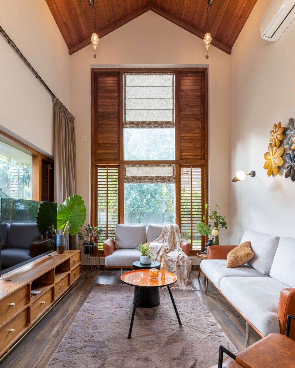 shavnyuyngah's tweet photo. Look at how many openings this house has, then ask why yours has so little.

HAYA sits in Wandoor, Kerala, built as a single storey around a central courtyard with a water feature at its heart. Big glass openings and wooden shutters run through the whole plan, so light pours in and every bedroom, including the master suite, looks out onto that courtyard instead of a blank wall.

The roof does real work too. Kerala clay tiles, no cornices, just a clean sloped line. That absence of ornament isn't a gap, it is restraint, and clay itself carries thermal mass that keeps the interior cooler through the day, the same climate logic we live under here.

This is built for the exact heat and humidity we deal with. So why do our own homes still get built with small windows and sealed-off rooms, in the same climate this house was designed to breathe in?

More images from this one are in the thread below.

Wandoor, Kerala, India. Architect: Farsa Buildesign. Completed 2023. Photography: Marc Frames.