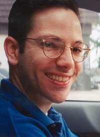 Daytobehappy's tweet photo. I have undertaken this project to put a face to 9/11 by posting a photo of everyone killed that day. If after everything that happened you can vote for the ideology that brought it about it's as if you are killing them yourself! Pictured below was 32 year old Paul Benedetti who was an assistant director at the Aon Corporation in the South Tower. His wife said that one of his talents was his wonderful sense of humor in which he was even able to find something funny coming down the stairs after the 1993 World Trade Center bombing, he could imitate all the characters from The Simpsons and had set up the office software to sound like Homer Simpson saying doh when somebody made a mistake. To forget even a single one of these people is a blasphemy!