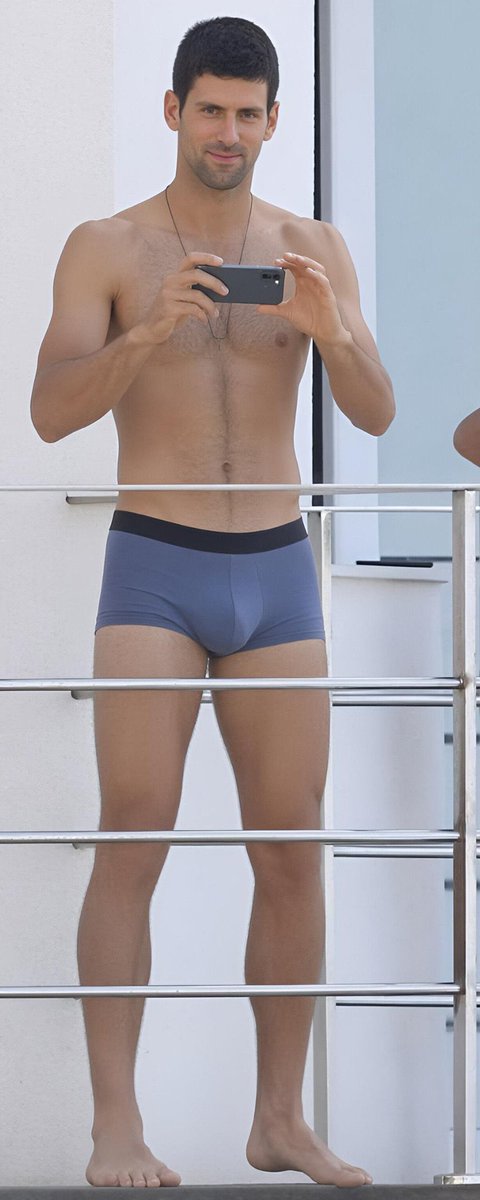 Coins_nuclear's tweet photo. Novak Djokovic snaps photos shirtless in fitted blue trunks on a Marbella balcony.... https://t.co/29E0VNbI9S