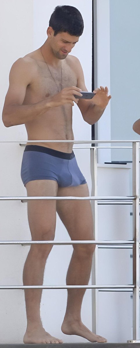 Coins_nuclear's tweet photo. Novak Djokovic snaps photos shirtless in fitted blue trunks on a Marbella balcony.... https://t.co/29E0VNbI9S
