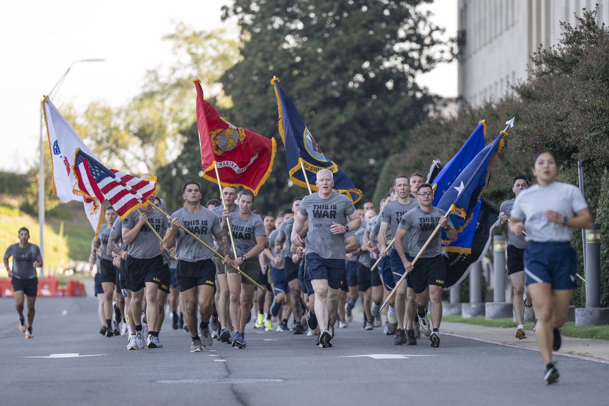 DeptofWar's tweet photo. Ahead of his State of the Force Address, @SECWAR joined 600 warriors at the Pentagon for morning PT. https://t.co/JhwcNmIZNO