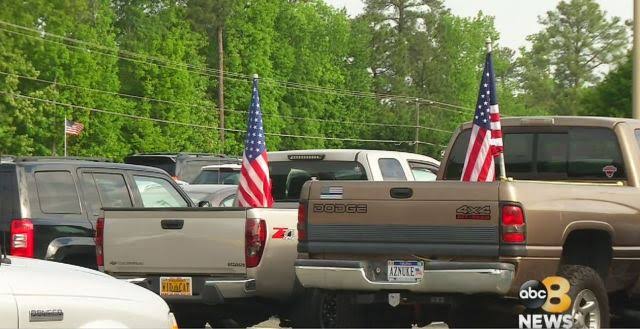 DavidJHarrisJr's tweet photo. 🚨WOW: A 17-year-old high school student stands his ground after being suspended for refusing to remove American flags from his truck!

Cameron Blasek, a senior at East Central High School in Indiana, arrived at school with full-sized American flags flying proudly from the bed of his pickup truck.

School administrators called Cameron into the principal's office, claiming the flags violated school rules and ordering him to take them down immediately.

When Cameron firmly refused to remove Old Glory, the school slapped him with an in-school suspension and threatened further disciplinary action.

Word of the suspension spread like wildfire across the community, sparking massive outrage among local parents, students, and community members who rallied behind his right to display the flag.

The very next morning, dozens of students rolled into the school parking lot with giant American flags mounted to their trucks and cars in an overwhelming show of solidarity.

Faced with massive pushback, the school district backed down, lifted the suspension, and officially reversed its policy to allow students to display American flags on their vehicles! 

This is what his truck looks like today!🇺🇸👏🏾