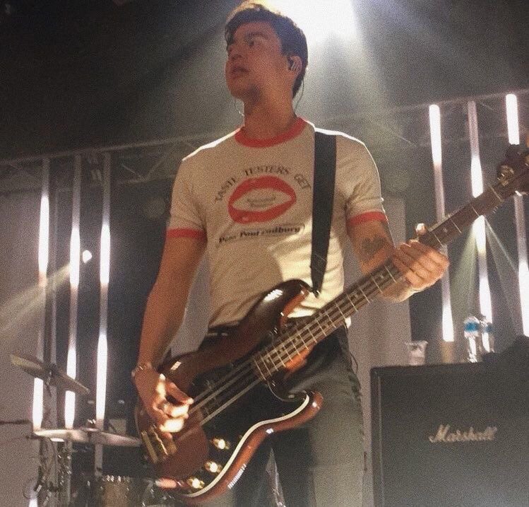 sabbyirwin's tweet photo. Someone needs to tell Calum to bring this shirt back https://t.co/VOAJOkhct6