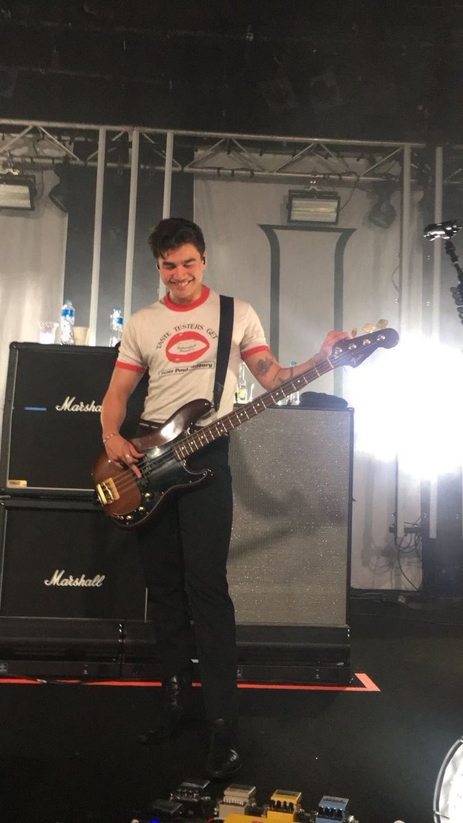 sabbyirwin's tweet photo. Someone needs to tell Calum to bring this shirt back https://t.co/VOAJOkhct6