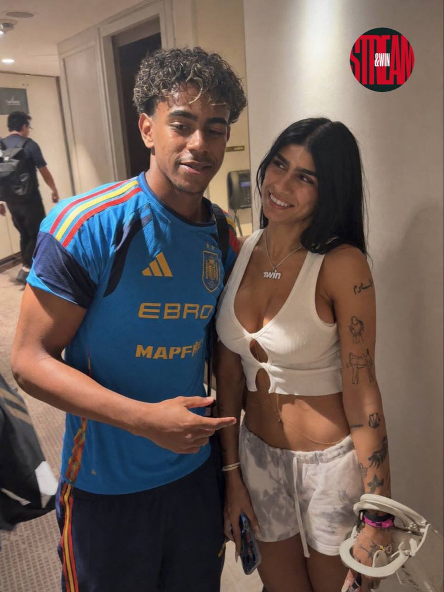 STREAMANDWIN's tweet photo. @miakhalifa shows up again with a neckless from @1win. 

Now she’s with Lamine Yamal. Boy, what are you doing with her? 🤔 https://t.co/6tloE55C3r