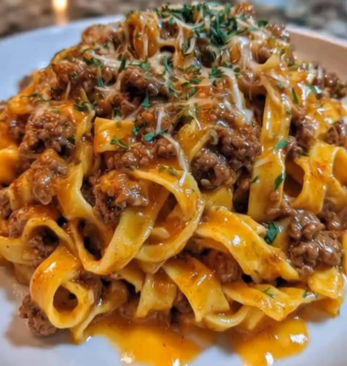 LabMariam48488's tweet photo. Classic Meat Lasagna
Yield: 8 portions | Prep: 30 min | Cook: 45 min | Rest: 15–20 min

Ingredients

Meat Sauce
- 15 ml olive oil
- 450 g ground beef
- 150 g onion, diced
- 12 g garlic, minced
- 30 g tomato paste
- 800 g crushed tomatoes
- 425 g tomato sauce/passata
- 3 g Italian seasoning
- 5 g salt
- 1 g black pepper
- 10 g fresh basil

Cheese Filling

- 425 g ricotta
- 1 egg
- 50 g Parmesan
- 225 g mozzarella, grated
- 10 g parsley
- Salt and pepper to taste

Assembly

- 250–300 g lasagna sheets
- 225 g mozzarella, grated
- Parsley, for garnish

Method

1. Sauce: Brown beef in olive oil. Add onion and cook until soft. Add garlic, seasoning and tomato paste; cook 1 minute. Add tomatoes and simmer 20–30 minutes until thick.
2. Filling: Mix ricotta, egg, Parmesan, 225 g mozzarella, parsley, salt and pepper.
3. Assemble: In a 33 × 23 cm dish, layer sauce, lasagna sheets, cheese filling and sauce. Repeat for 3 pasta layers. Finish with sauce and remaining mozzarella.
4. Bake: Cover with foil and bake at 190°C for 25 minutes. Uncover and bake another 15–20 minutes until golden and bubbling.
5. Rest: Allow to rest 15–20 minutes, garnish with parsley and portion into 8.

Quality: Rich, thick sauce, tender pasta, creamy layers and a golden, melted cheese topping.
#MariamFoodLab