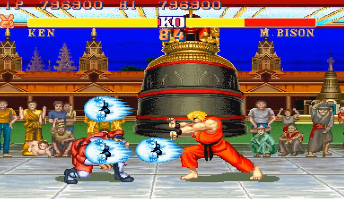 A screenshot of the classic arcade game 'Street Fighter II' showing the character Ken performing a 'KO' move against M. Bison, with a score of 798900 displayed at the top.