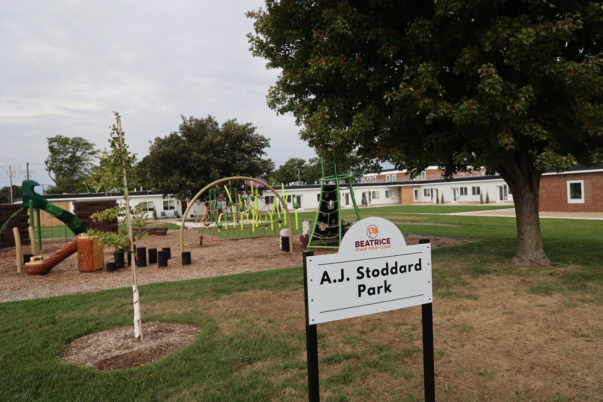DevelopNebraska's tweet photo. Congrats to Beatrice on completion of Stoddard Place apartments! Local leaders found a way to repurpose a closed elementary school as affordable housing for seniors. DED provided funding through the Rural Community Recovery Program to help build a playground in the courtyard! https://t.co/gPduNOYgsP