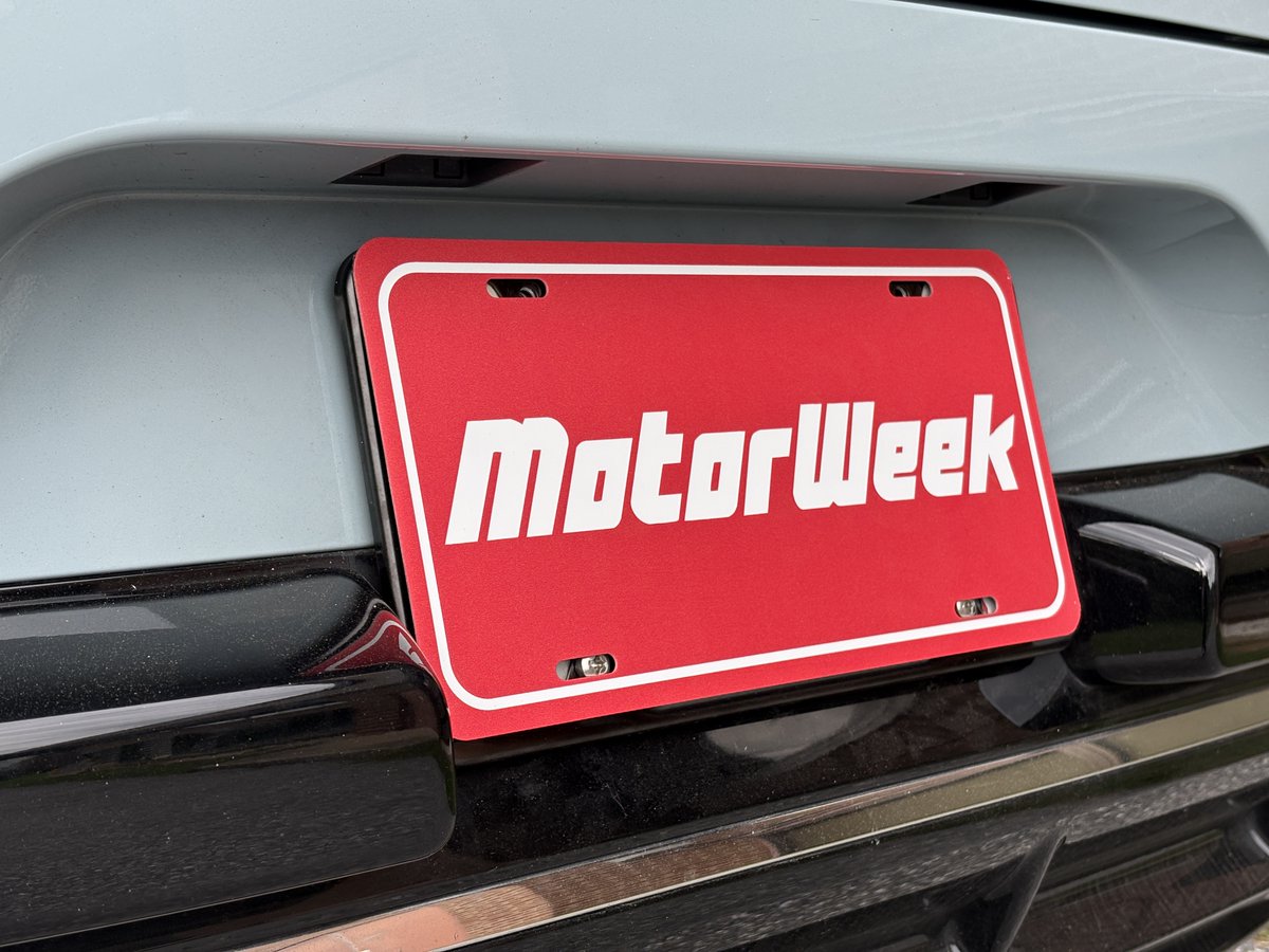 MotorWeek's tweet photo. You asked and we listened! More MotorWeek merch is now available for purchase!

✨ For the first time ever, you can watch a Retro Review marathon wearing your very own classic tee printed with the original MotorWeek logo from 1981! 📺

🚗  Plus a limited supply of signed John Davis license plates are back in stock! 🖊️

🚨  And for those who have always wanted their own MotorWeek vanity plate, unsigned plates are available! 🚦

SHOP HERE: https://t.co/d0Iqgwk0D4