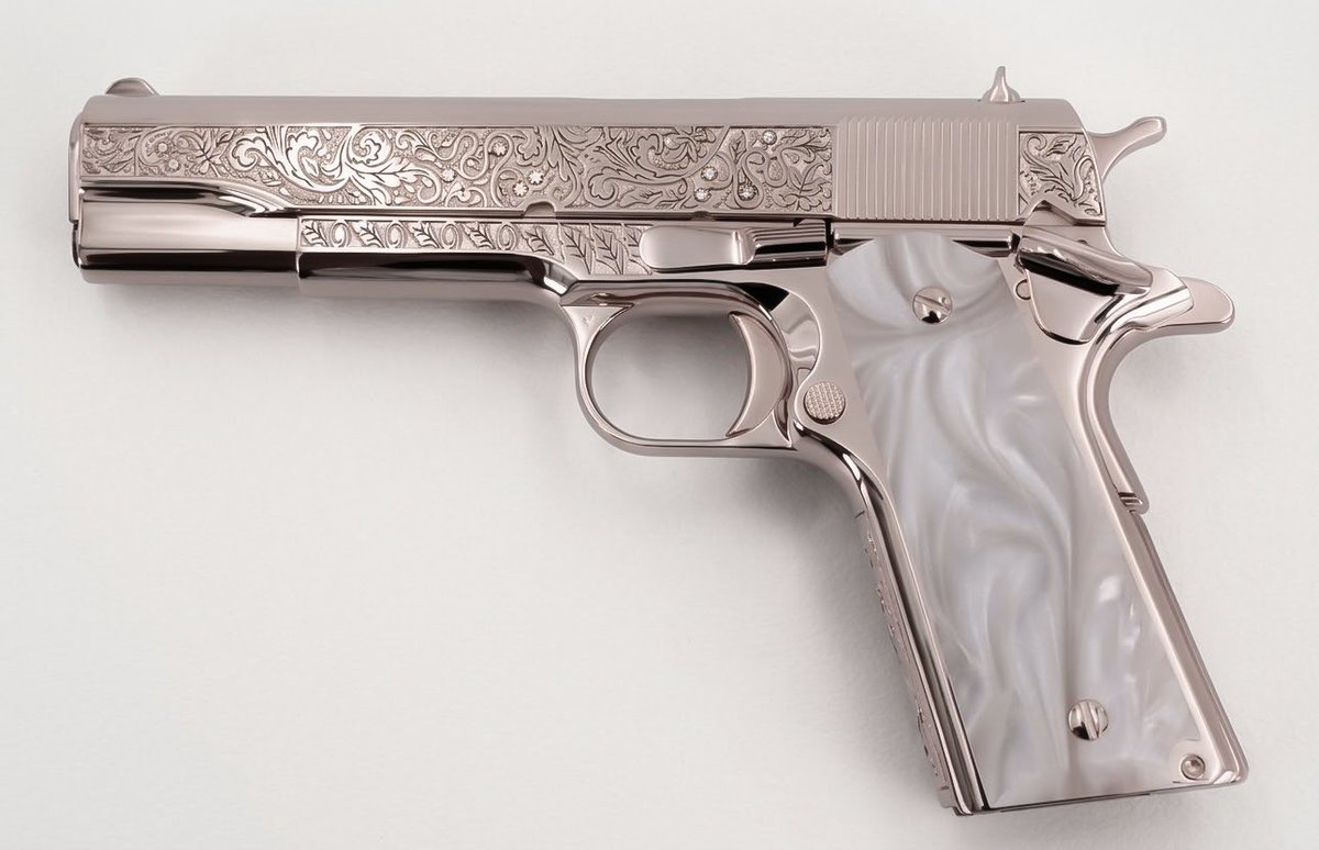 glirttery's tweet photo. colt ‘1911’ government in 18k rose gold with diamonds and pearl grips https://t.co/D1HGoKtvIF