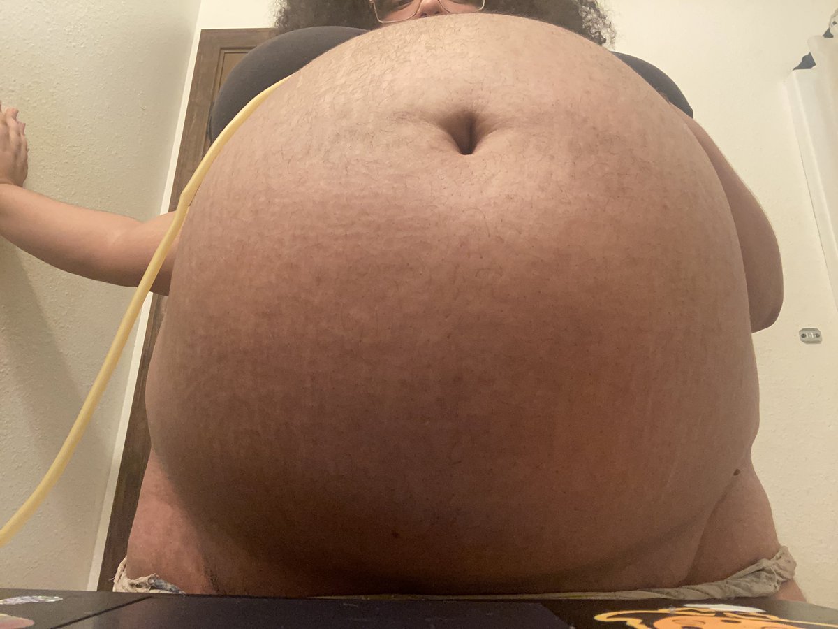 Balloonfat5's tweet photo. More cake shake practice. Got to 3L shake and 2.5L water while inflating. Gulping down air to force more space in my belly then immediately downing cake shake n water. Itd be such a shame if someone fed me afterwards🫣❤️🎈💥#bellyinflation #bigbelly #fatbelly #pregnant #fat #bbw https://t.co/Uu1Sj7iyaE