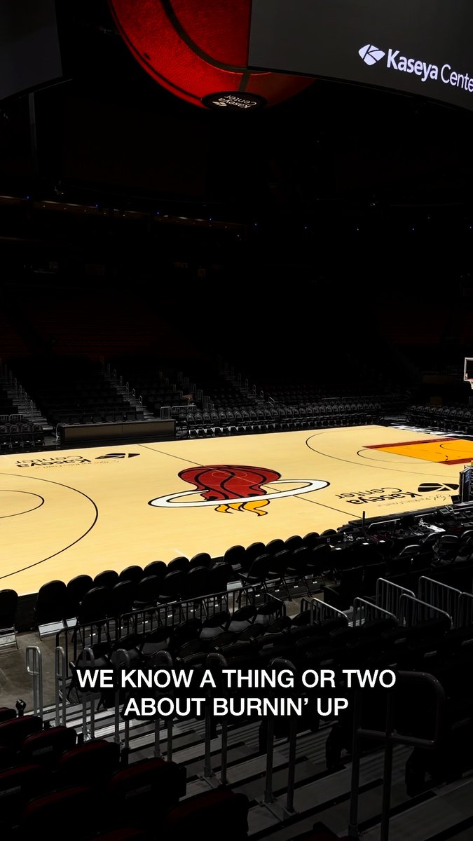 A photo of an empty Kaseya Center basketball court featuring the Miami Heat logo, with the caption 'WE KNOW A THING OR TWO ABOUT BURNIN' UP'.