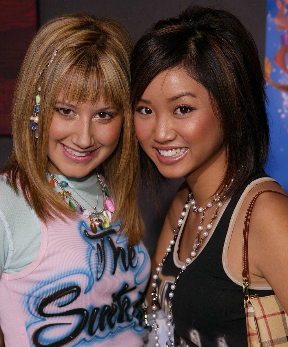 ThrowbackTisx's tweet photo. September 30th, 2004: Ashley Tisdale and Brenda Song attend the Aladdin 2-Disc Special Edition DVD Premiere in Hollywood, California https://t.co/TfzKanPOgC