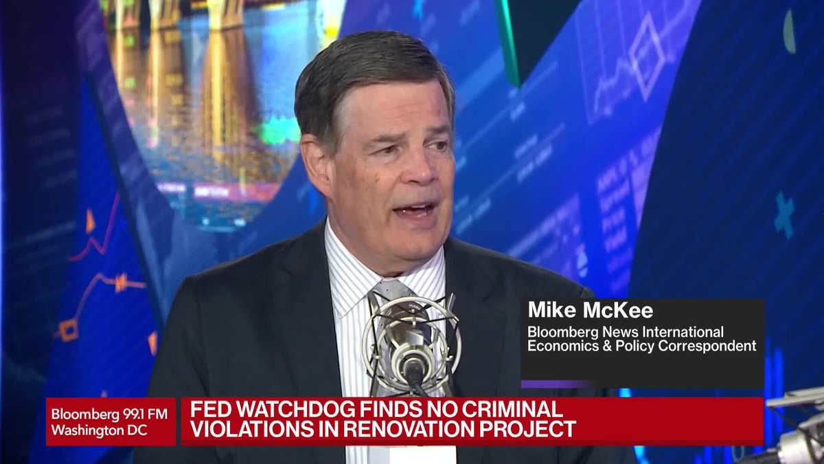 Mike McKee, Bloomberg News International Economics & Policy Correspondent, appears on Bloomberg 99.1 FM Washington DC, with a banner reading "FED WATCHDOG FINDS NO CRIMINAL VIOLATIONS IN RENOVATION PROJECT" displayed at the bottom of the screen, illustrating his coverage of the inspector general report on the Federal Reserve's building renovation.