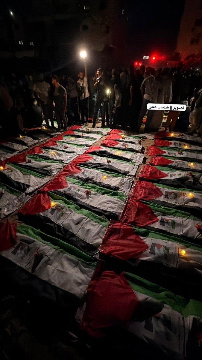 QudsNen's tweet photo. Palestinians bid farewell to the bodies of 105 Palestinians, including children, recovered from under the rubble of the Al-Taj building in Gaza, which Israel bombarded on 25 October 2023. https://t.co/h8uAXfb4aE