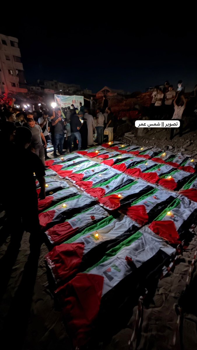 QudsNen's tweet photo. Palestinians bid farewell to the bodies of 105 Palestinians, including children, recovered from under the rubble of the Al-Taj building in Gaza, which Israel bombarded on 25 October 2023. https://t.co/h8uAXfb4aE
