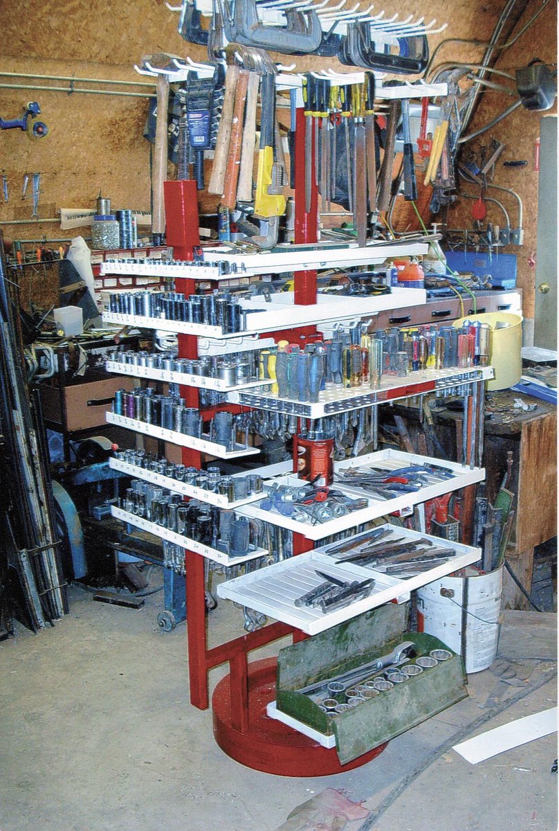 FarmShow's tweet photo. There’s no digging through cabinet drawers or toolboxes when Brian Haubrich needs a 3/4-in. wrench or socket. Every tool he needs is out in plain sight. “I built a tool tree with long hooks and shelves to hold practically every tool I have. The best part is I can reach most of my tools without moving far from my vise,” says Haubrich. https://t.co/67AnfdndXJ