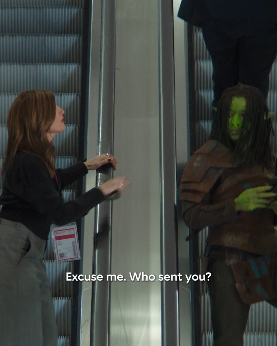 A woman with a visitor badge confronts a green-skinned, dreadlocked figure in leather armor through a window, with the caption "Excuse me. Who sent you?"—a scene that humorously reflects the post's commentary on a "State of booktok rn lowkey" with the #YouthHBO tag, suggesting book readers feel invaded by unfamiliar pop-culture enthusiasts.
