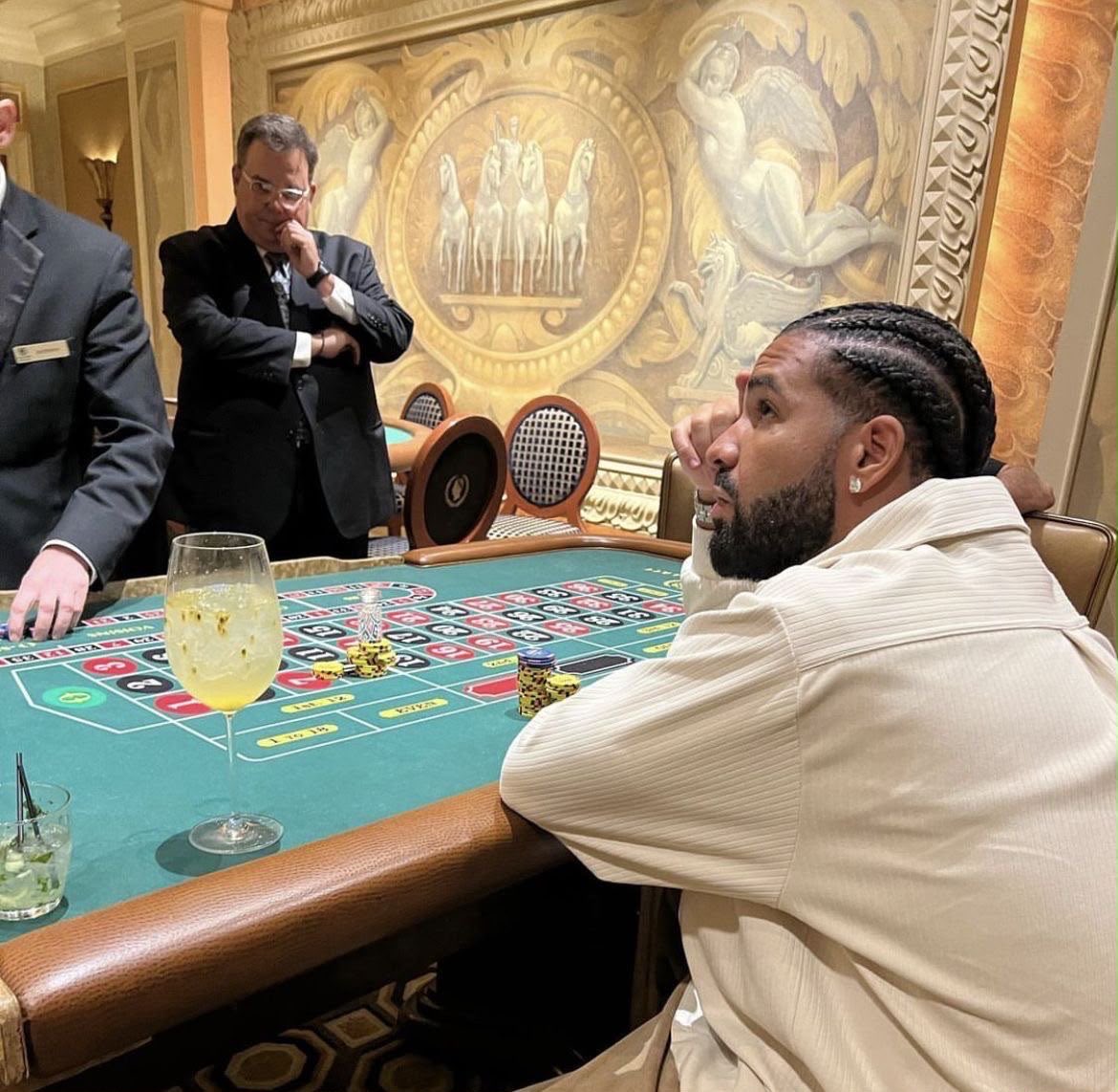 chideradmd's tweet photo. Everyone’s partying and Drake is locked in on the bets https://t.co/qwKgbUw39C