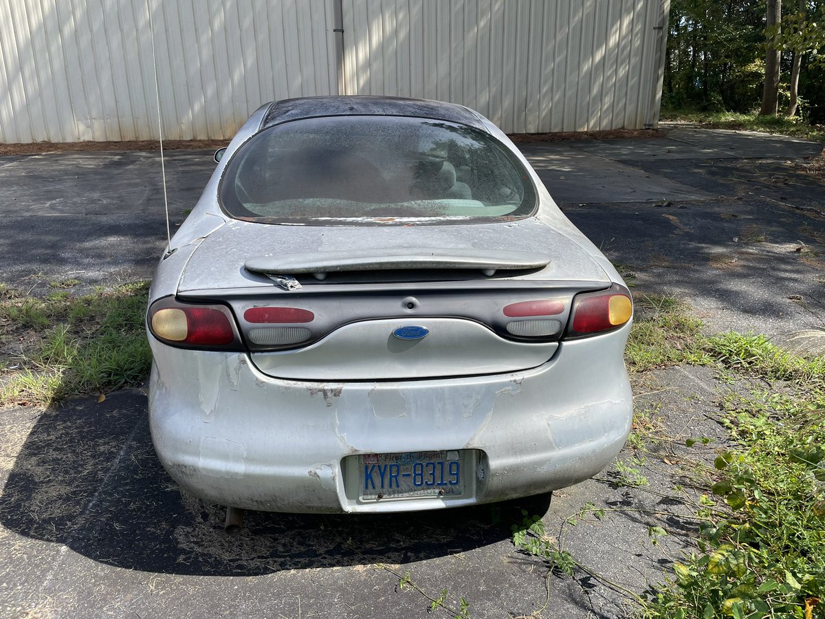 speed_visions's tweet photo. The infamous ‘98 Taurus that Don Miller and crew modified to get NASCAR to approve the new bodywork.

Looks absolutely wrong. Egregious shape on the tail compared to the real car for that year. https://t.co/ojC7ZaN4Mb