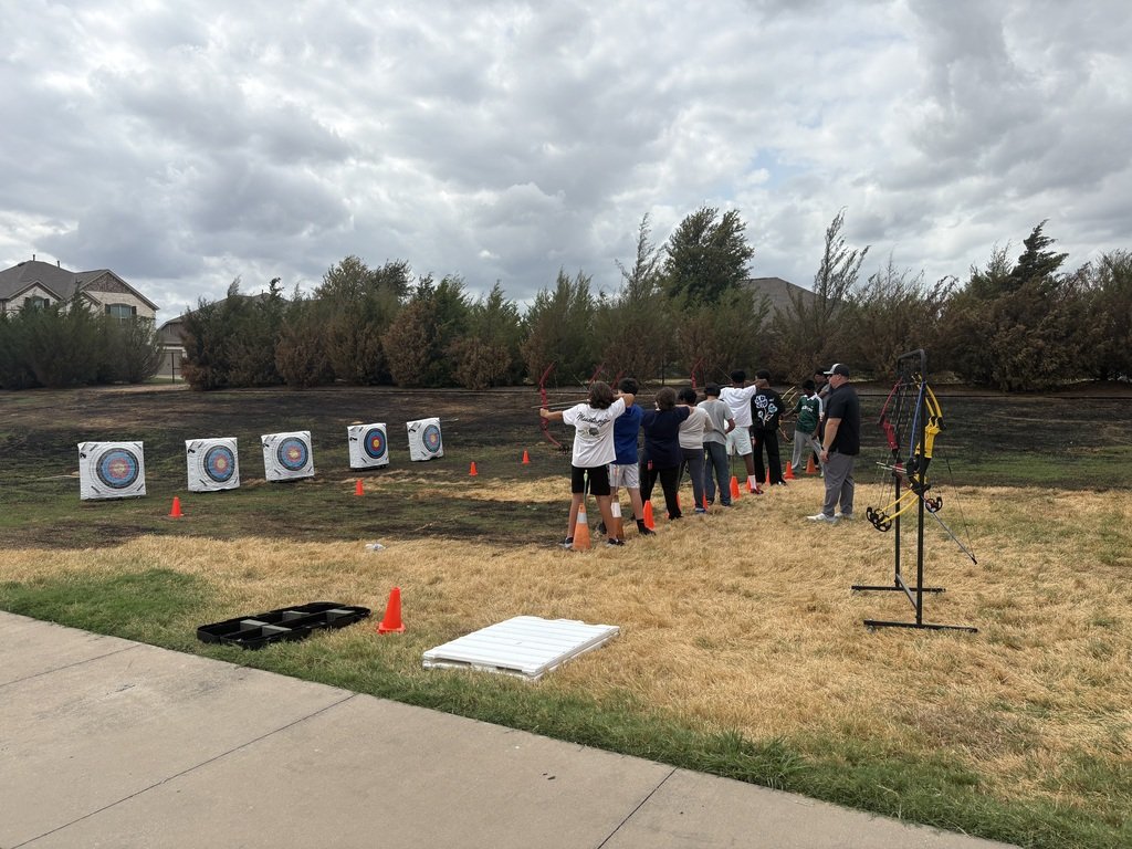 ProsperHaysMS's tweet photo. Students in Outdoor Ed were able to squeeze in a little archery practice, complete with self-assessment and peer feedback, before the rain hit today! 🎯 https://t.co/Lr8TF5f0hz