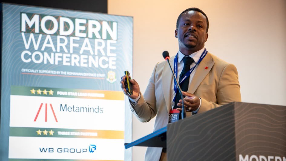 GDMS_C's tweet photo. The future battlefield depends on connecting data, sensors, autonomous systems and combat vehicles into one digital ecosystem. At @DefenceIQ’s Modern Warfare Conference, our Head of Product, C5ISR Solutions, Emeka shared how MESHnet® provides the secure, scalable foundation for next-generation C5ISR and interoperability reinforcing our commitment to Romania and NATO's Eastern Flank.