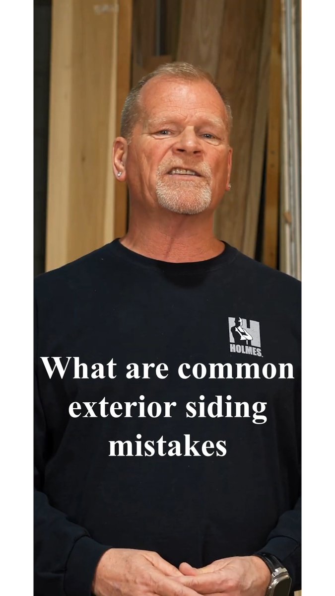 A man with a gray goatee wearing a black sweatshirt with a "HOLMES" logo stands before wooden planks, with overlay text reading "What are common exterior siding mistakes".