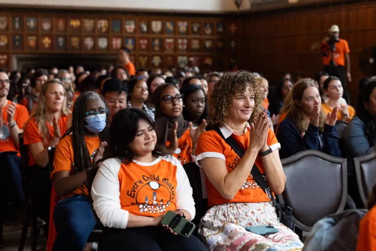 Shannon Simpson (right), executive director of Indigenous initiatives, was among the hundreds of attendees in Hart House's Great Hall on the St. George campus 