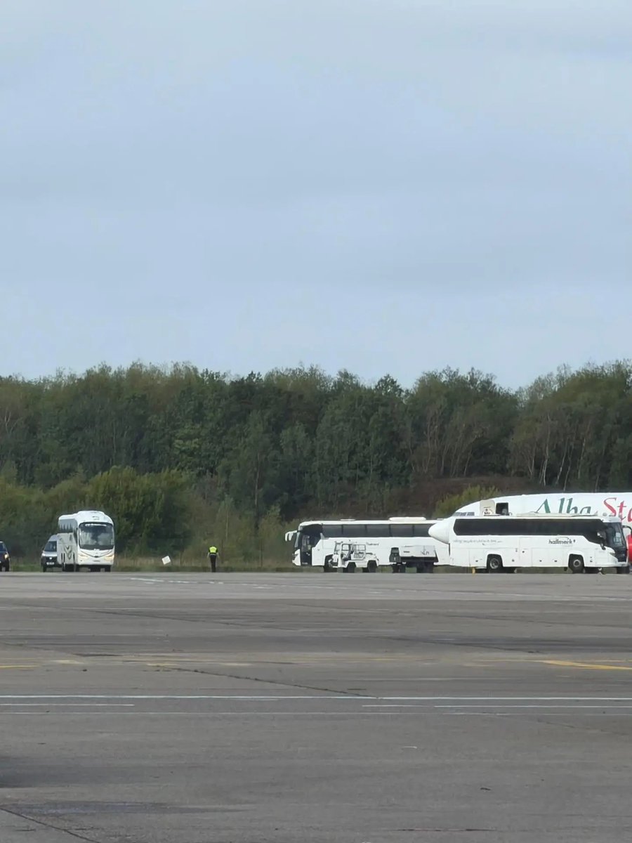 MrKnight2205's tweet photo. ⚠️ EXCLUSIVE ⚠️

Over the last few weeks, several eyewitness reports have emerged suggesting the UK government is flying migrants directly into Liverpool airport.

The images below are verified and show a Boeing 737-800, registration EC-MTV.​

These images were taken by an eyewitness on the tarmac of Liverpool Airport on 9th September.

The eyewitness has stated that an entire planeload of migrants were disembarked from the aircraft and placed straight onto pre-prepared coaches and driven away.

The witness also stated that after the migrants were disembarked, another group of migrants boarded the plane, all in handcuffs.

The second group were reportedly Albanian nationals being deported.

Now here's the scary part.

The Boeing (EC-MTV) is owned and operated by AlbaStar, a Spanish airline which has a contract with the UK Home Office to fly illegal migrants back to France under the 'one in, one out' deal.

However, these 'one in, one out' deportation flights depart from Stansted, nowhere near Liverpool.

Prepare yourself for the next part.

I have personally tracked the movements of this aircraft using flight data and other sources, and on the 9th of September, EC-MTV arrived at Liverpool John Lennon airport from DUBLIN.

Flight data shows this aircraft left Dublin at 8:36am (Irish standard time) and landed in Liverpool at 9:09am on the 9th September.

It then departed Liverpool again at 11:15am. 

Later the same day the aircraft landed in Tirana, Albania and then flew back to Stansted.

These verified aircraft movements confirm the insiders information regarding the plane being used to return Albanian deportees after disembarking the migrants from Ireland.

I've checked, and the coaches parked on the tarmac next to the aircraft come from a company which also has a migrant contract with the Home Office.

Just to confirm, I also checked whether AlbaStar normally flies between Dublin and Liverpool - they don't, ever.

So why oh why on God's green Earth is the British government flying migrants directly into the UK from ANOTHER safe country?!