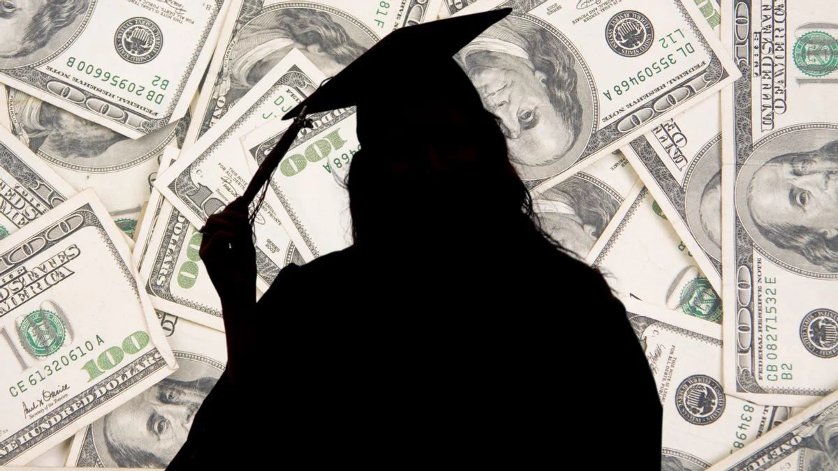 The image shows a background of large dollar-bills, with the black cut-out silhouette of a university graduate against it.