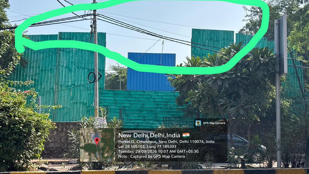 Saurabh_MLAgk's tweet photo. Big Breaking 

Forest land worth several hundred crores is being encroached under the patronage of Rekha Gupta Govt.
Under the guise of loudly playing out DJs,behind these illegal green/blue tin sheet walls, trees are being cut illegally, illegal walls are being erected overnight to encroach forest lands worth hundreds of crores.

At Chhattarpur 100 ft road & 60 Ft road near Shamshan Ghat , builder mafia is active under political patronage.  After development of few luxury malls in this area, the greed of politicians is growing like wild fire.

This is at the cost of ur lungs. BJP Govt gives bhashan on pollution, “ek ped Maa ke naam” , but in reality, thousands of trees are being illegally cut in this forest area. 

Environment & Forest Dept under Minister @mssirsa is responsible for protesting forests but it appears to be part of criminal conspiracy to loot forest land. 

All agencies are sitting quite - @DelhiPolice @MCD_Delhi @CMODelhi @LtGovDelhi