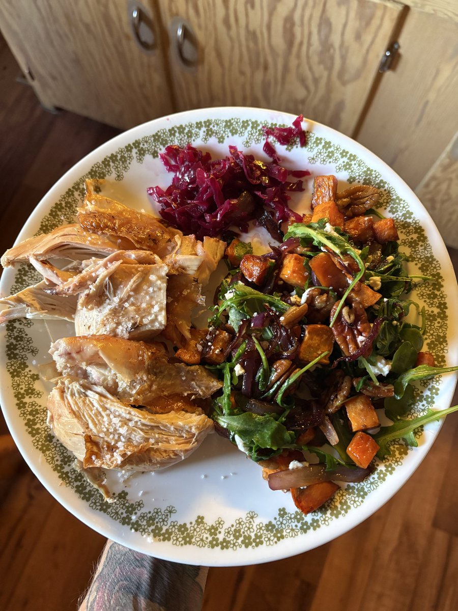 MrsKristinaCook's tweet photo. We roasted a chicken to share for dinner this evening. I made a warm salad to go alongside it with caramelized red onions, toasted pecans, roasted sweet potato, arugula, and goat cheese. Then I tossed it all together with olive oil and balsamic vinegar. 

I skipped the salad and had chicken, drippings, and sauerkraut. Genevieve went for chicken, butter, and a few bites of sweet potato. I’m a big fan of only making one meal work for the whole family because I’m not making 3 different meals for 3 different microbiomes, 3 different goals, or 3 different taste buds. I’m making one meal with multiple different ways of accommodating different nutritional strategies.