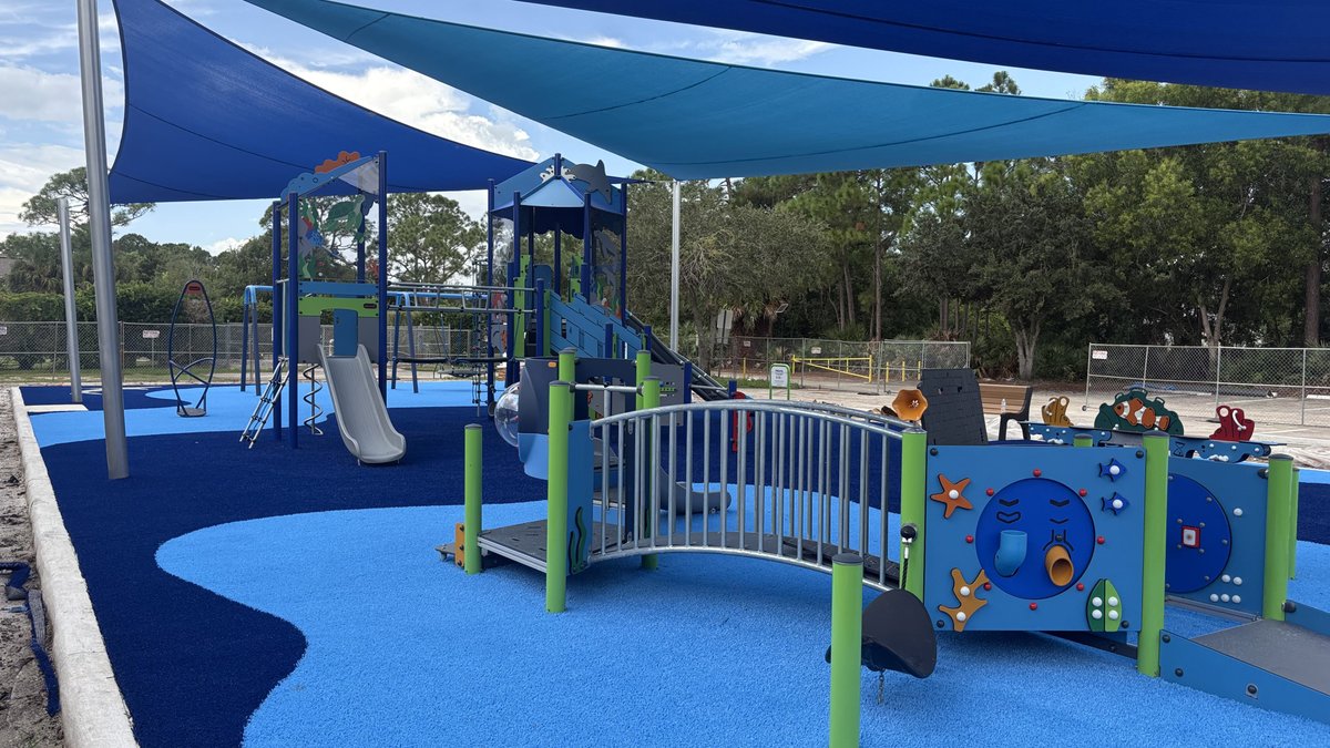 _Shawgrass's tweet photo. River Place Park in @CityPortStLucie features a playground with a new, vibrant blue Shawgrass surface with 🐬 and 🦈 images. Fun for all ages. 🛝

#Shawgrass #Playgrounds #CreativeSurfaces https://t.co/hcQx6Fw1Qr