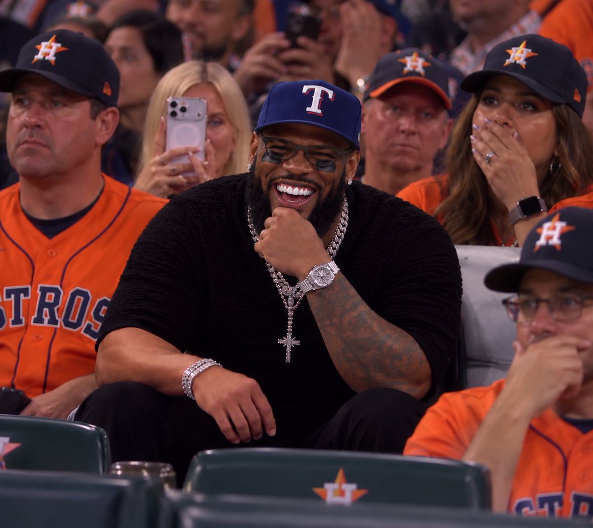 Oh_Katie_Babie's tweet photo. Adolis Garcia stopped by the Astros game to hate watch Bryan Abreu give up a 3 run home run.

Savage. https://t.co/aCgfGCrrKo