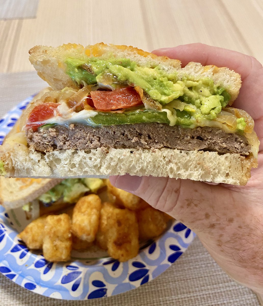 Roman_OT_Empire's tweet photo. Patty Melt with jalapeños, tomato, bacon, grilled onions, avocado, and Pepper Jack! Along with some tots, cause they are whimsical 🤣#pattymelt #burger #dinner #tatertots https://t.co/VzTL6HTwNe