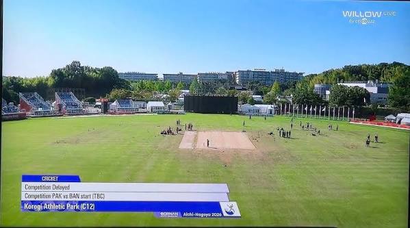 olympics28LA's tweet photo. 🚨🏏 TOSS DELAYED!

🇵🇰 Pakistan vs Bangladesh 🇧🇩 — Men's semifinal at the Asian Games 2026.

⚠️ The toss is delayed due to a wet outfield at Korogi Sports Park, Japan.

👀 A further inspection is expected before the match can begin.
👇
https://t.co/NAVDMSimCm

#AsianGames2026 https://t.co/wPtOQfoPU5