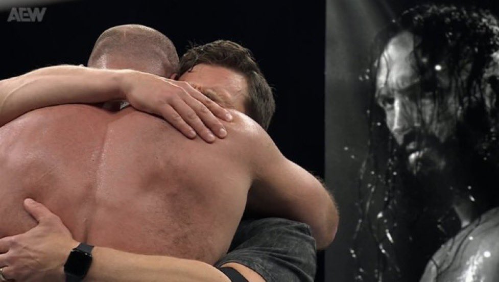 AIRGold_'s tweet photo. I was holding it together for most of this show, but Jon Moxley and Bryan Danielson hugging for the first time in yearssss with PAC looking on...

Yeah, I'm fuckin crying now 🥹 https://t.co/5m4Fq7kIlw