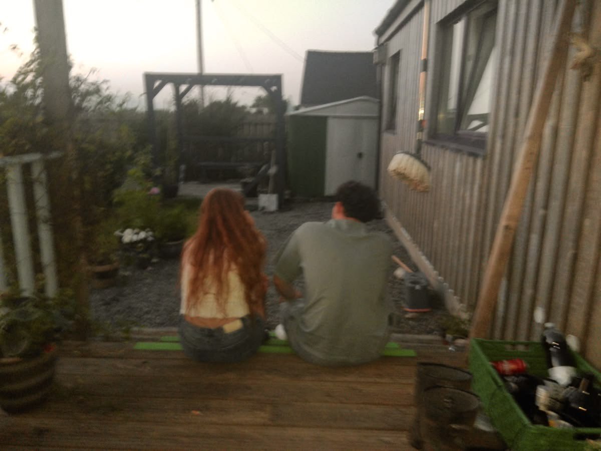 hjpgmw's tweet photo. this photo makes me think of the summer before harry’s 6th year. where hinny sits together on the porch in the burrow’s backyard talking to each other before playing with quidditch with ron and the twins https://t.co/x4wZ84gvyS
