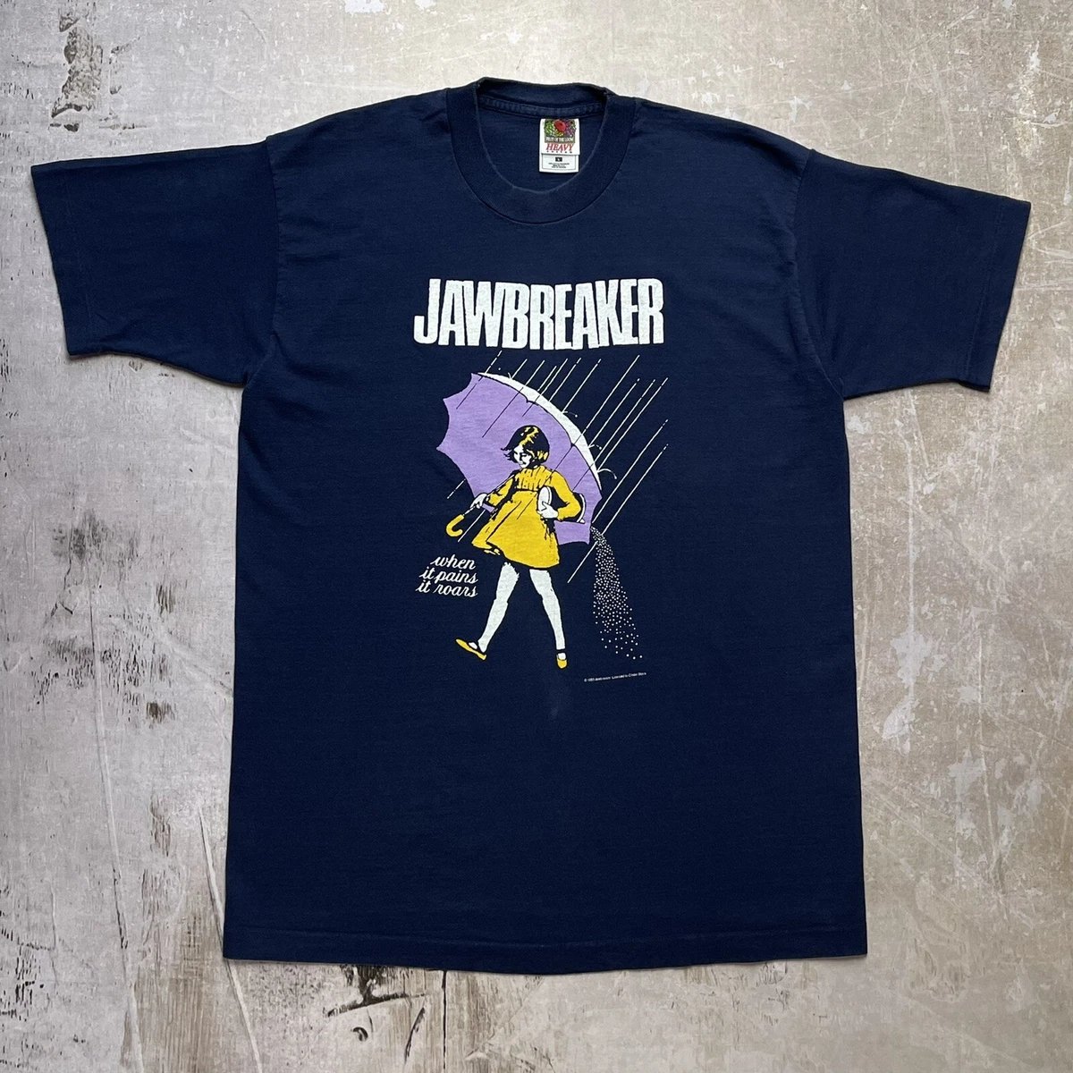 ranmasaotome96's tweet photo. I'm not American, so when I got into the band Jawbreaker and saw this shirt, I thought it was such a striking visual that was heavily representative of their overall sound and image.

Imagine the look on my face when I realised it was the mascot for a salt company. https://t.co/qY3u29EVMv