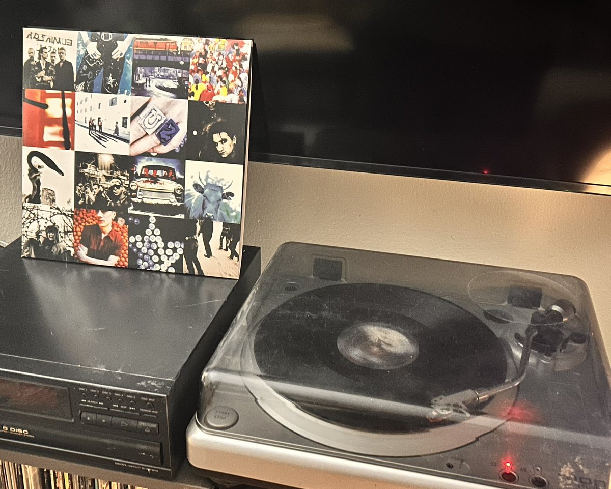DailyTurntable's tweet photo. Day 273 - Spinning at Daily Turntable, @U2 - Achtung Baby.  Released in 1991, this was their seventh studio album. They incorporated industrial, electronic dance music, and alternative rock influences into their music, adopting a darker, more introspective, and ironic tone. https://t.co/ZkC7DoEe0w