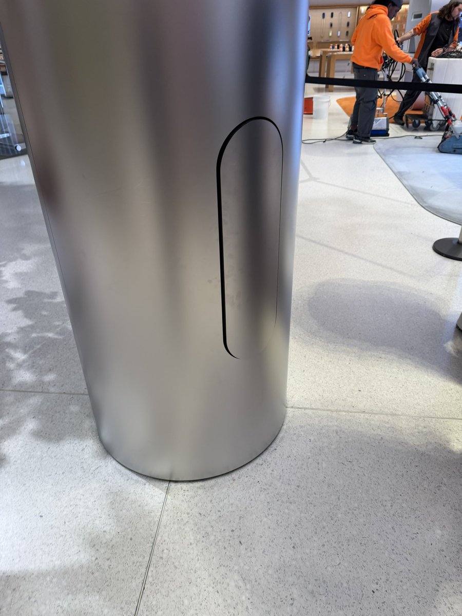 chairaficionado's tweet photo. @Lstruere The Apple Store on 5th Ave is filled with incredible details. This perfect little door keeps the fire extinguisher hidden. https://t.co/ySkDuEVYQe