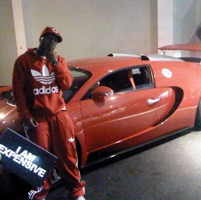 Sound_Scrape's tweet photo. Birdman with his Red Bugatti Veyron (2014) https://t.co/vGZgn29fqV